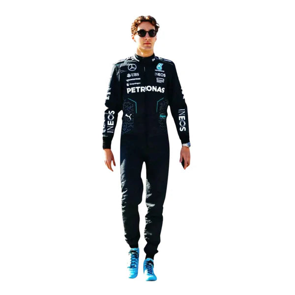 Person wearing a black racing suit with various sponsor logos on a white background