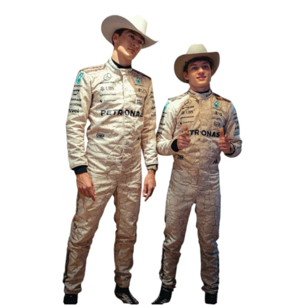 Two individuals wearing racing suits with Petronas branding on a white background