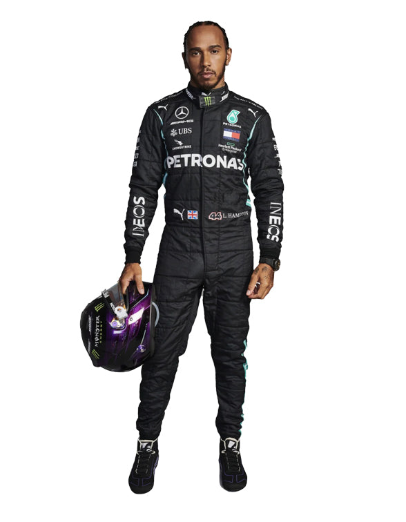 Person wearing a black racing suit with various sponsor logos, holding a helmet.