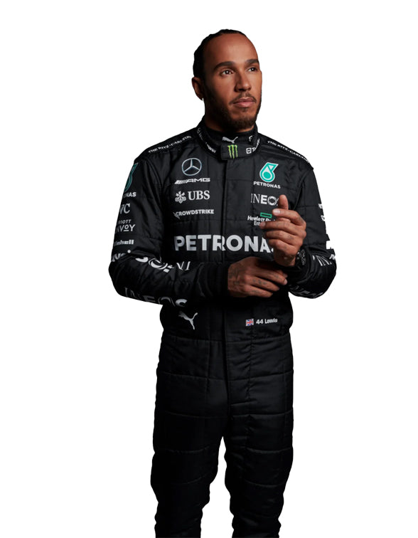 Person wearing a black racing suit with various sponsor logos on a white background